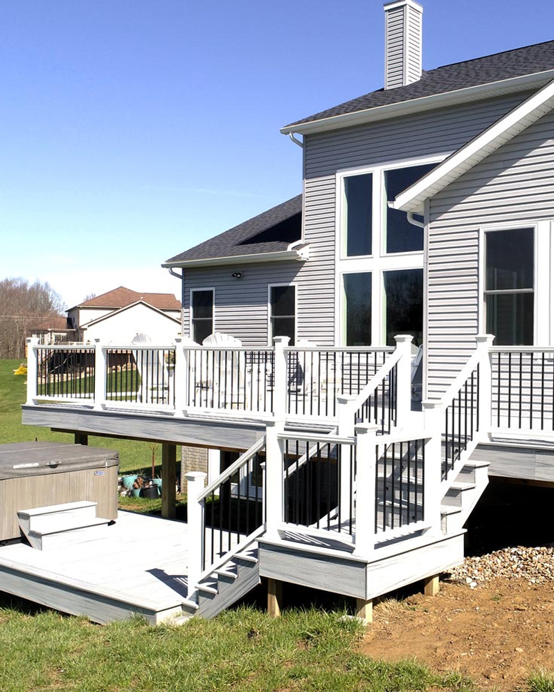 Buckeye-Elite-Porter-Deck-Railing-cropped Elevated composite deck showcasing custom decks in Dundee backyard.